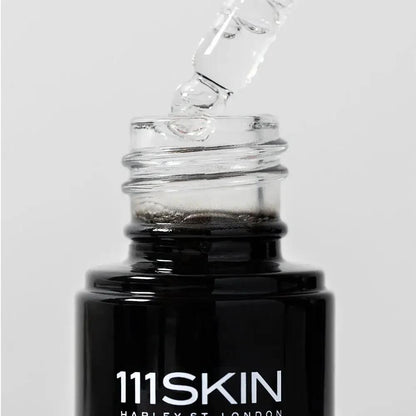 111SKIN Black Diamond Vitamin C Brightening Booster serum in a black bottle with dropper on Tampa Home & Garden Store
