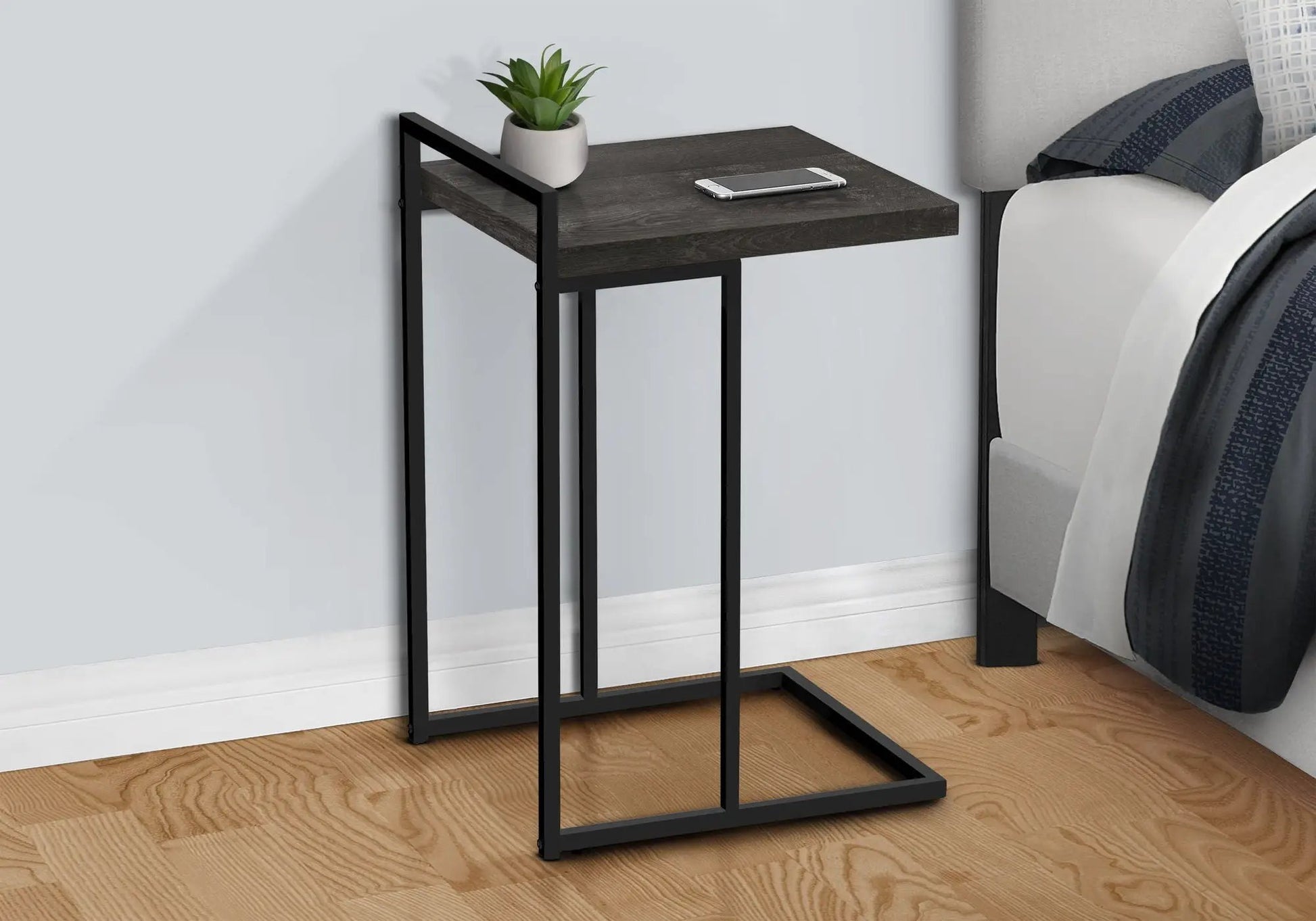 Accent Table C-shaped dark wood top with black metal frame; plant and phone by Unique Piece Furniture on Tampa Home & Garden Store