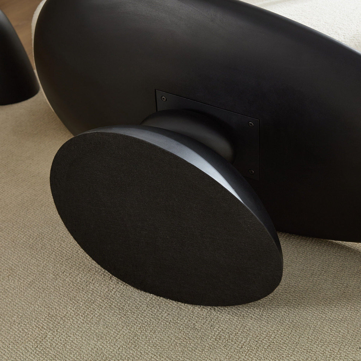 Lucky Stone Shaped End Table with sculptural curved black base on Tampa Home & Garden Store