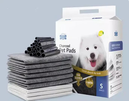 Dog Training Pads FLIPSTYLEZLLC charcoal thickened absorbent pads beside a box with dog image on Tampa Home & Garden Store