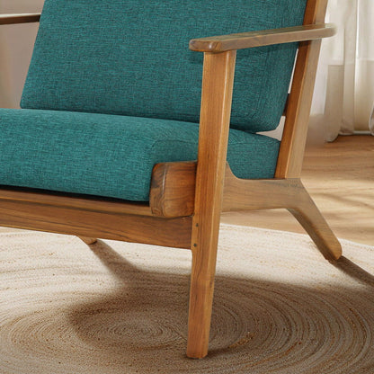 Lounge chair in light blue upholstery with a wood mid-century frame on Tampa Home & Garden Store