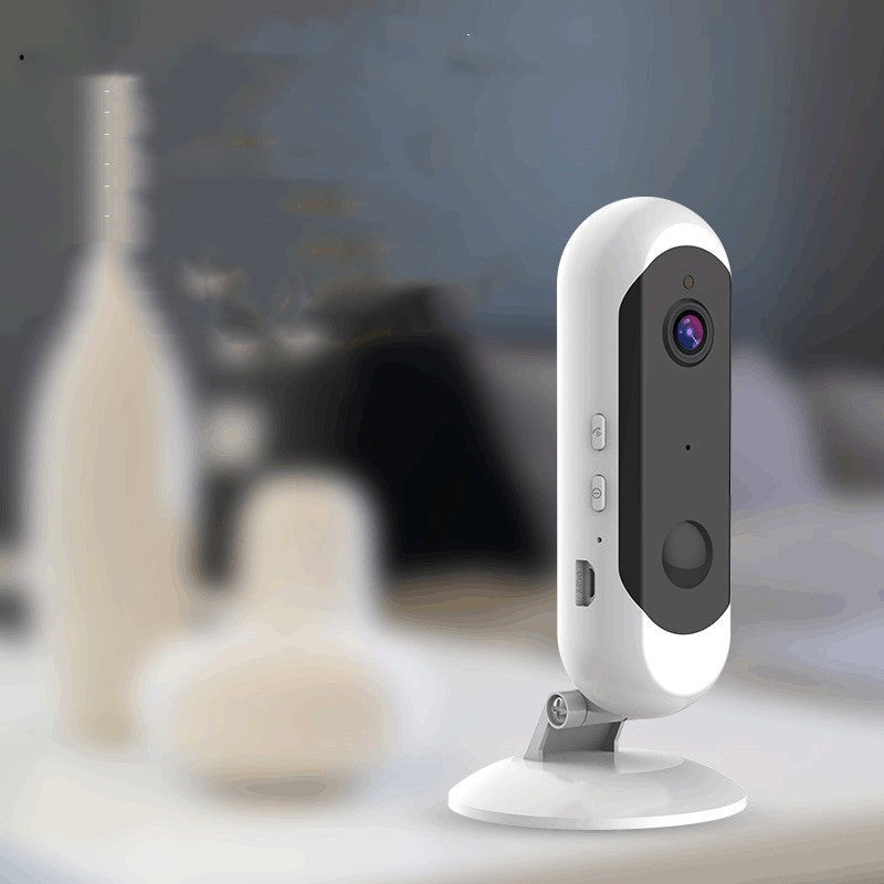 HD wireless battery camera on white stand with black front panel on Tampa Home & Garden Store