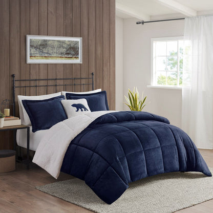 Full/Queen plush to sherpa comforter set in navy with white sherpa reverse on bed on Tampa Home & Garden Store