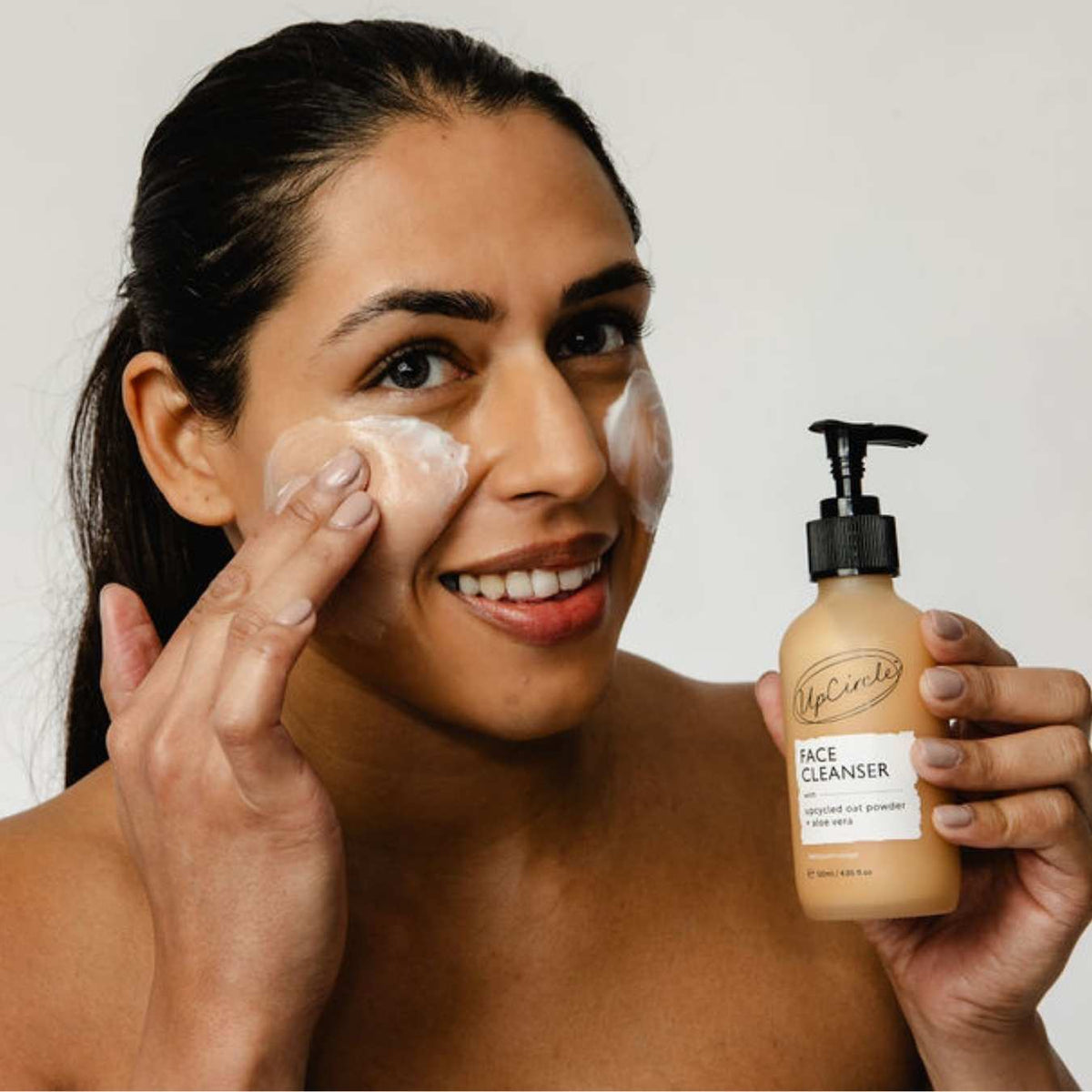 UpCircle Cleansing Face Milk with Oat Powder + Aloe Vera, beige bottle with pump on Tampa Home & Garden Store