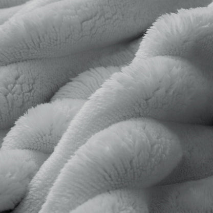 Faux fur fabric close-up in white with plush, fluffy texture on Tampa Home & Garden Store
