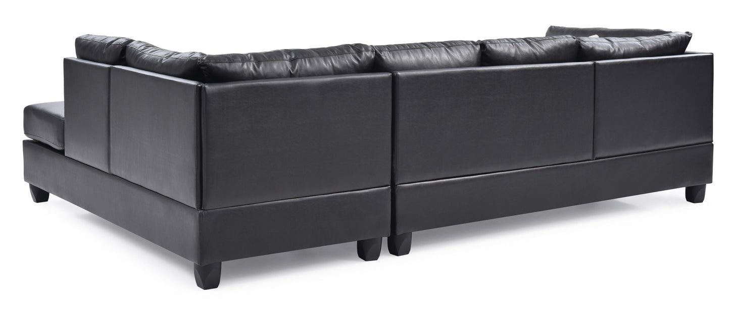 Malone Comfort Sectional by HouseOfZazla, charcoal faux leather with low-profile feet on Tampa Home & Garden Store