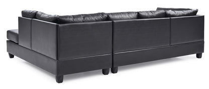 Malone Comfort Sectional by HouseOfZazla, charcoal faux leather with low-profile feet on Tampa Home & Garden Store