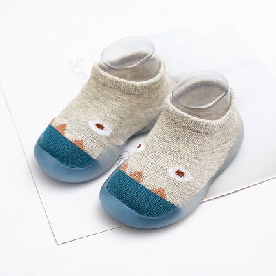 Infant cotton anti-slip socks pair in beige with blue toe caps and soles, cartoon face design on Tampa Home & Garden Store