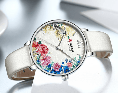 Women's Stevvex watch with decoupage floral dial and large Roman numerals, white strap on Tampa Home & Garden Store