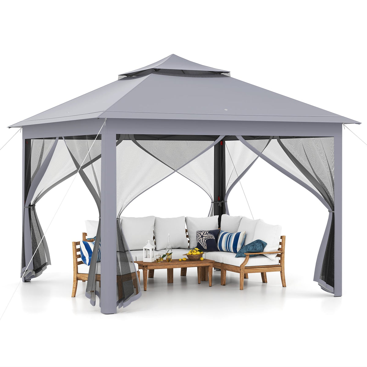 GemGear 11x11 ft two-tier pop-up gazebo with gray canopy and mesh side panels over seating on Tampa Home & Garden Store