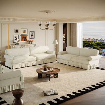Comfortable Cloud Sofa with Rolled Arms and Skirt in cream fabric, beige living room setup on Tampa Home & Garden Store