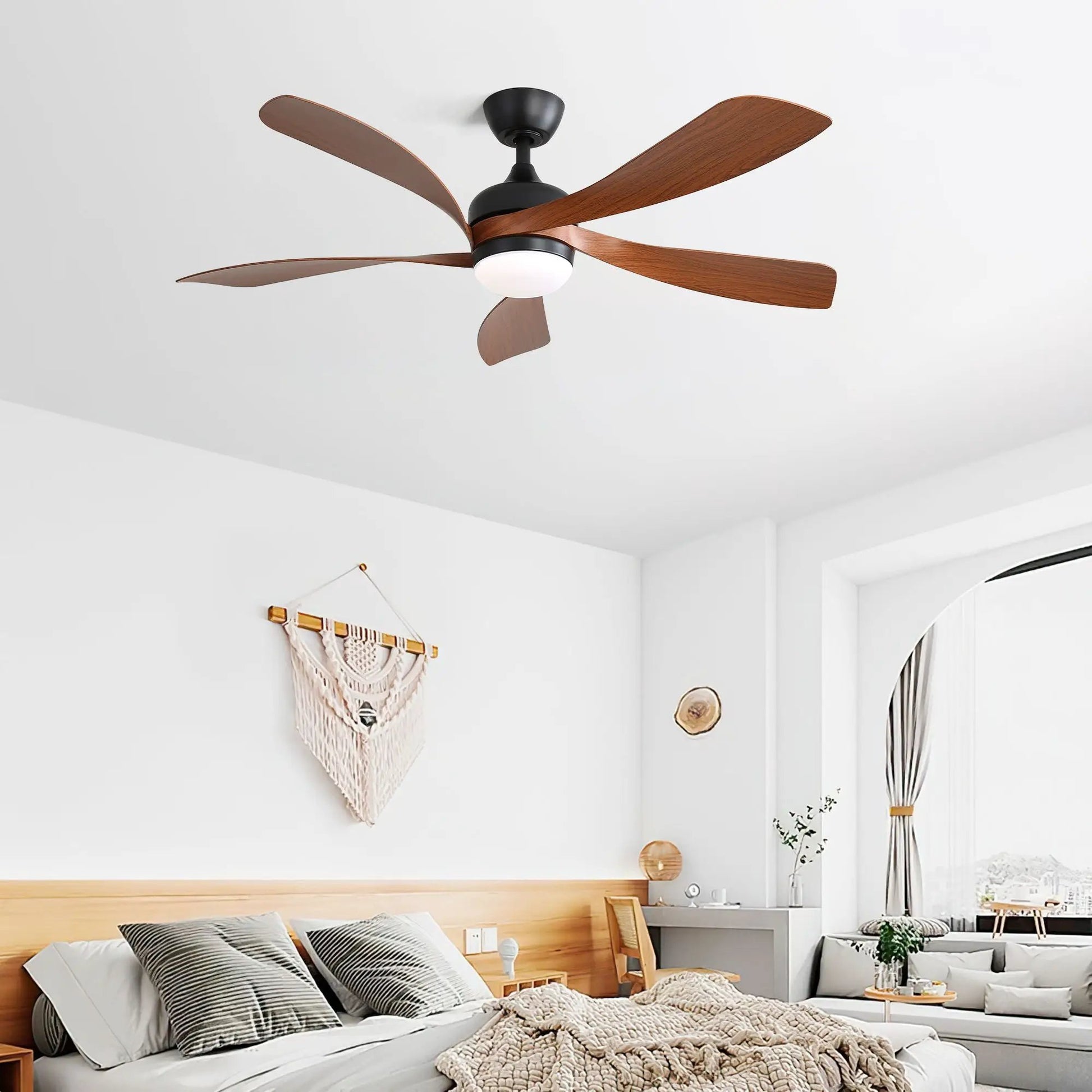 Ceiling fan with DC motor and integrated light, black housing and wood blades in bedroom on Tampa Home & Garden Store