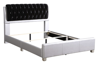 Tufted upholstered bed with black velvet headboard and crystal buttons, silver metal frame on Tampa Home & Garden Store
