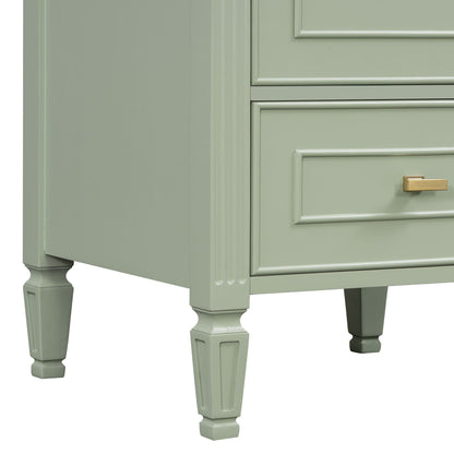 Retro bathroom vanity with sage green finish featuring paneled drawers turned legs brass bar handle on Tampa Home & Garden Store