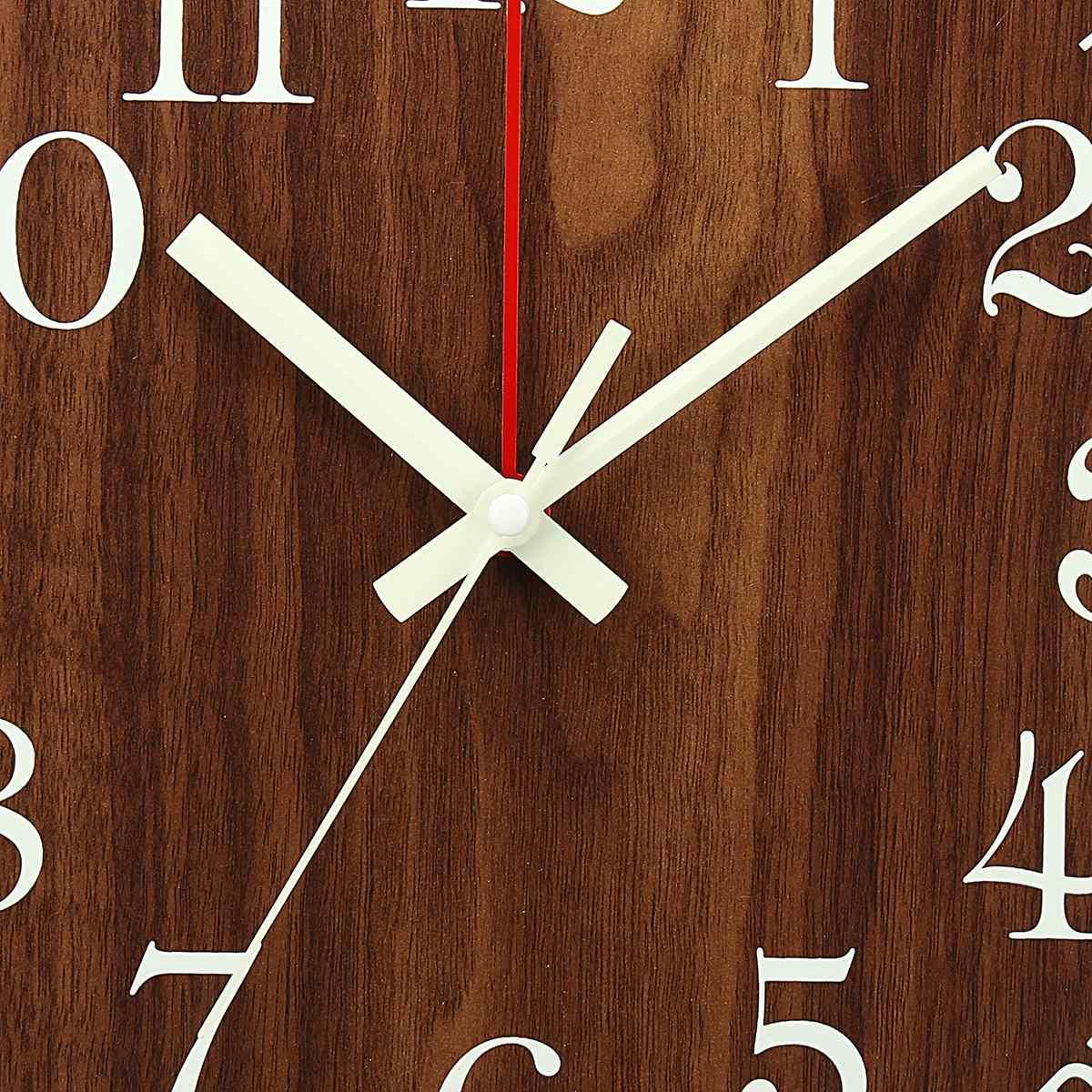 12-Inch luminous wood wall clock by Stevvex with white hands on dark wood finish on Tampa Home & Garden Store