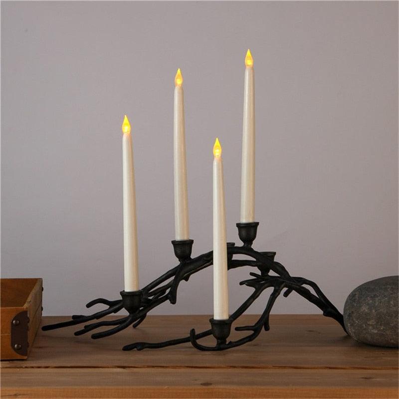 Stevvex flameless LED taper candles four-pack, warm white, on black branch candle holder on Tampa Home & Garden Store