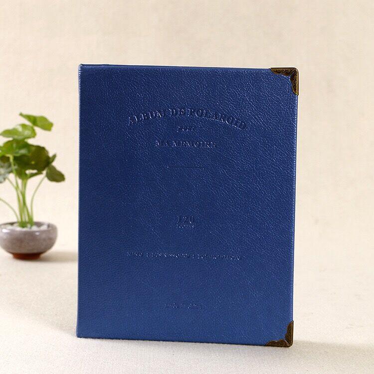 120-pocket PU leather photo album in blue by Stevvex with corner guards for 3in Polaroid minis on Tampa Home & Garden Store