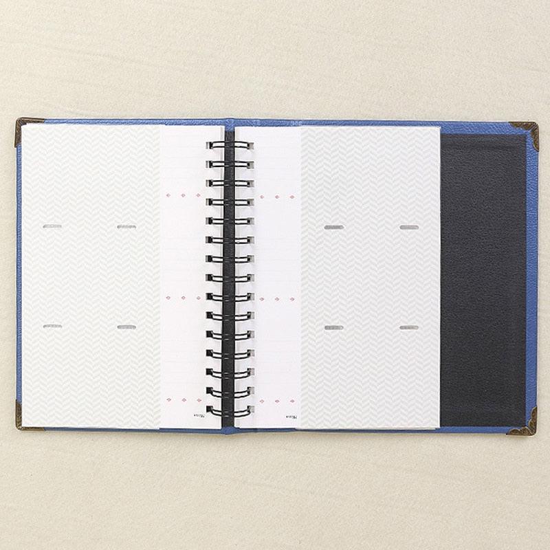 Stevvex 120-pocket PU leather photo album with blue cover, spiral bound, open to pages on Tampa Home & Garden Store