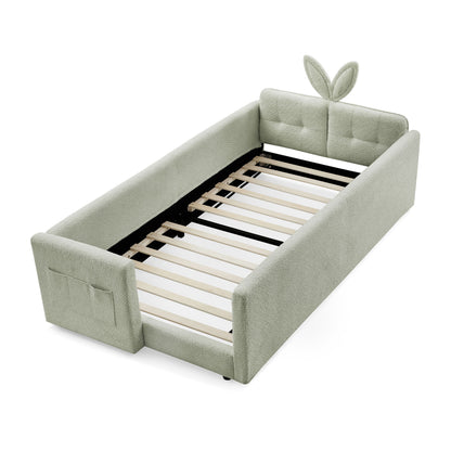 Upholstered platform bed frame with rabbit-ear headboard and safety rail in sage green fabric on Tampa Home & Garden Store