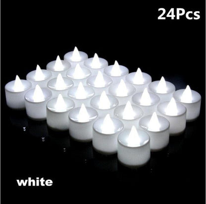 Stevvex white flameless LED tea lights, 24 pcs flicker candlelike candles on black surface on Tampa Home & Garden Store