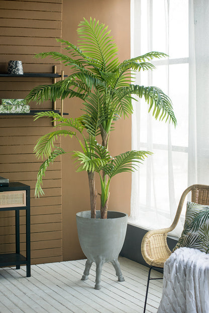 D16x22 Planter with Legs gray ceramic planter housing a tall palm plant on a sunlit porch on Tampa Home & Garden Store