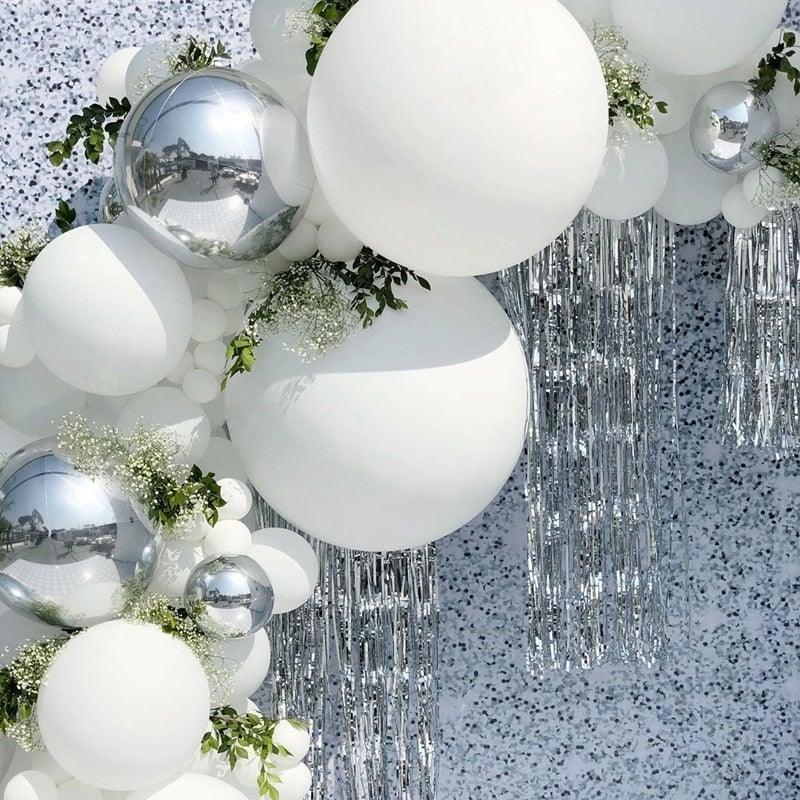 125 pc white and silver confetti balloon arch kit with greenery accents and silver fringe backdrop on Tampa Home & Garden Store