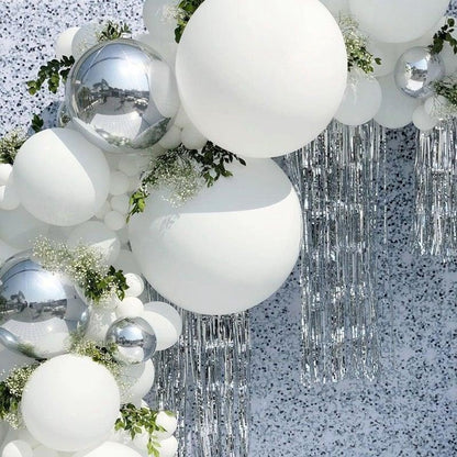 125 pc white and silver confetti balloon arch kit with greenery accents and silver fringe backdrop on Tampa Home & Garden Store