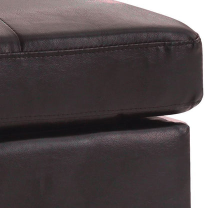 Upholstered ottoman in dark faux leather with visible top-stitching on Tampa Home & Garden Store