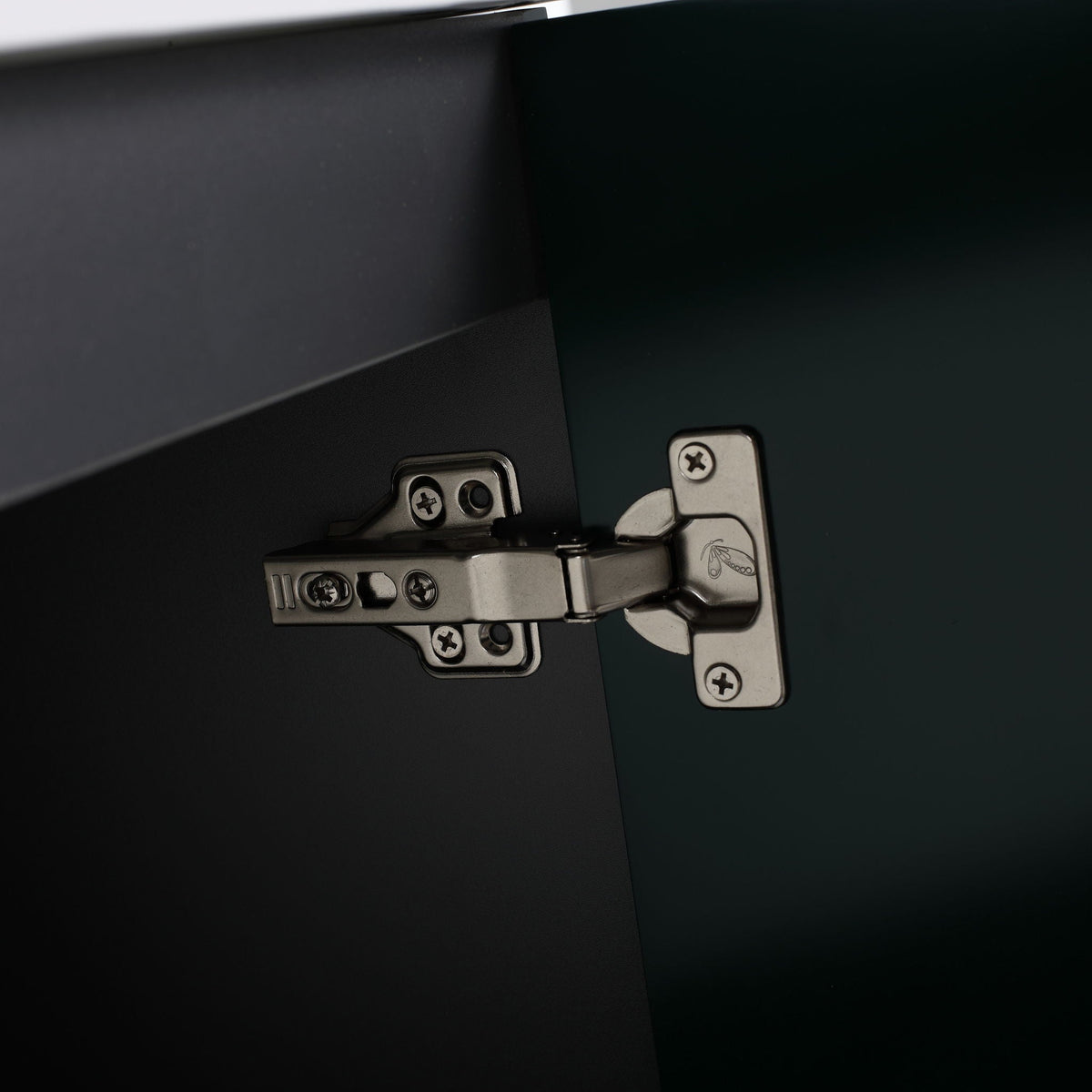 Freestanding bathroom vanity soft-close hinge close-up on dark cabinet panel HouseOfZazla on Tampa Home & Garden Store