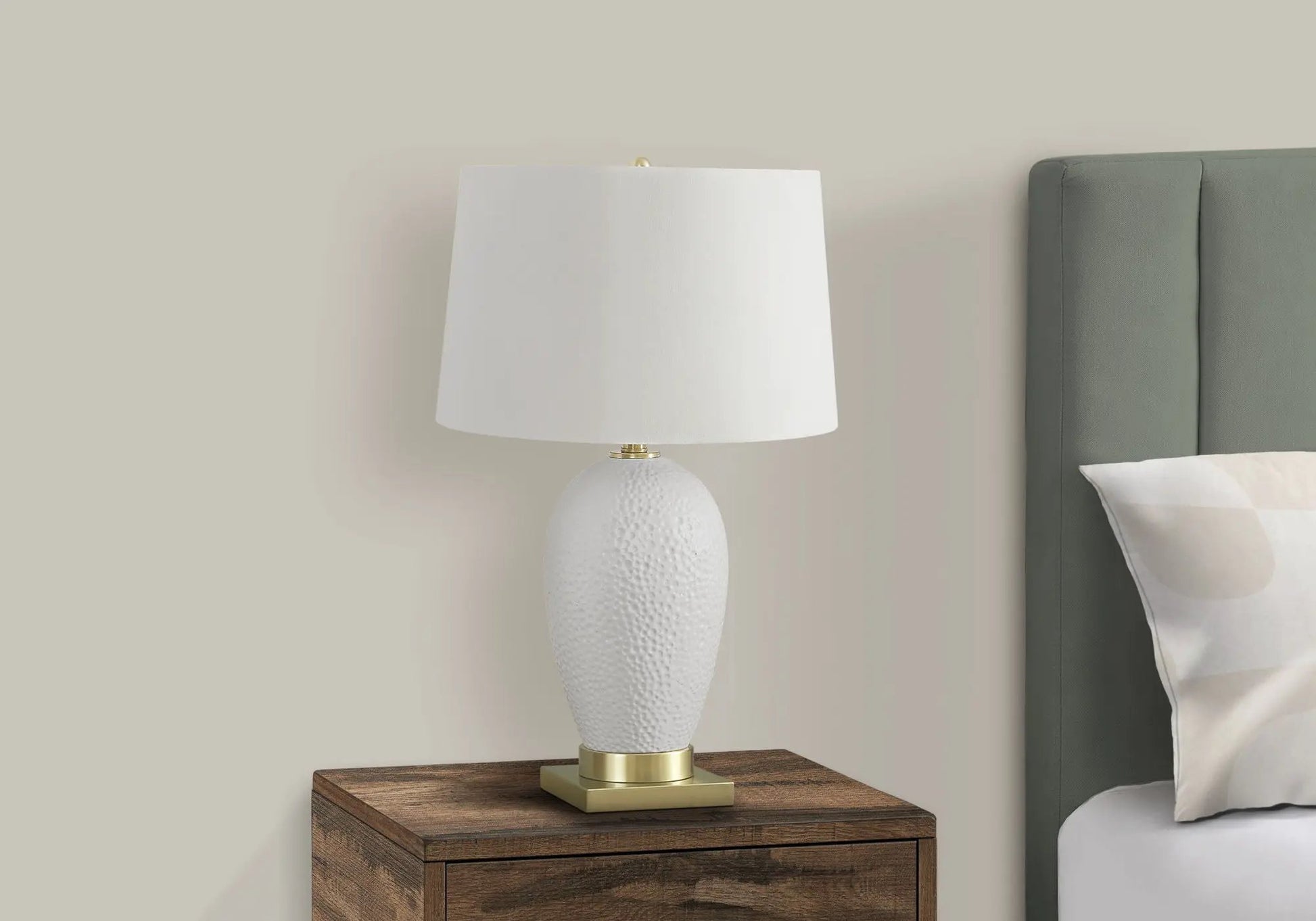 Table lamp ceramic white with textured body, white shade and brass accents on wood nightstand on Tampa Home & Garden Store