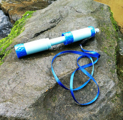 Outdoor Water Filter Camping Survival Tool blue and white plastic body with blue end caps and strap on Tampa Home & Garden Store