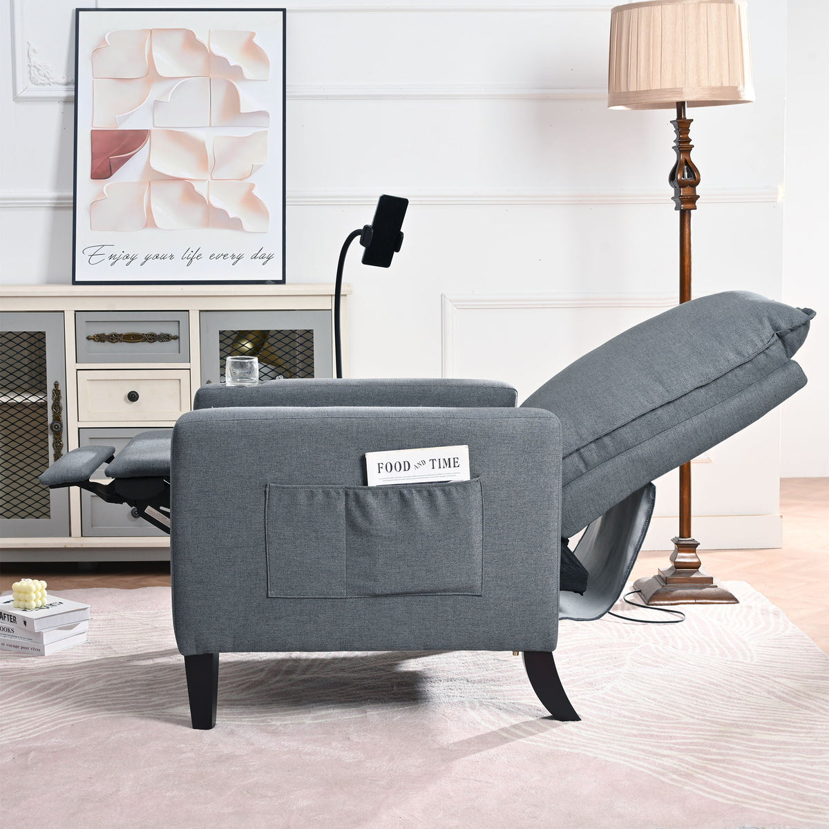 Gray fabric recliner chair by HouseOfZazla with built-in magazine pocket in living room on Tampa Home & Garden Store