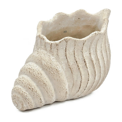 Nautilus shell planter in textured beige sand-and-cement finish with ribbed spiral design on Tampa Home & Garden Store