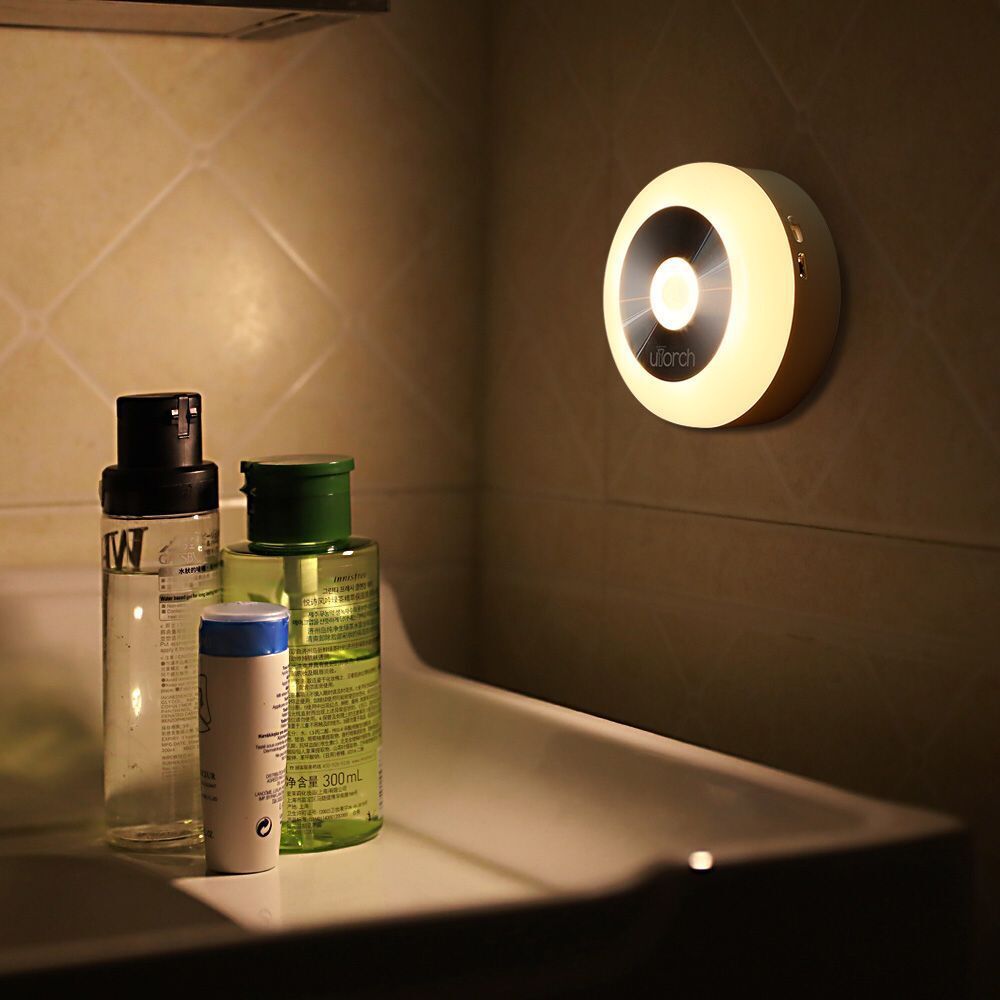 LED Motion Sensor Night Light by UpTrend Deals, white ring on bathroom wall beside bottles on Tampa Home & Garden Store
