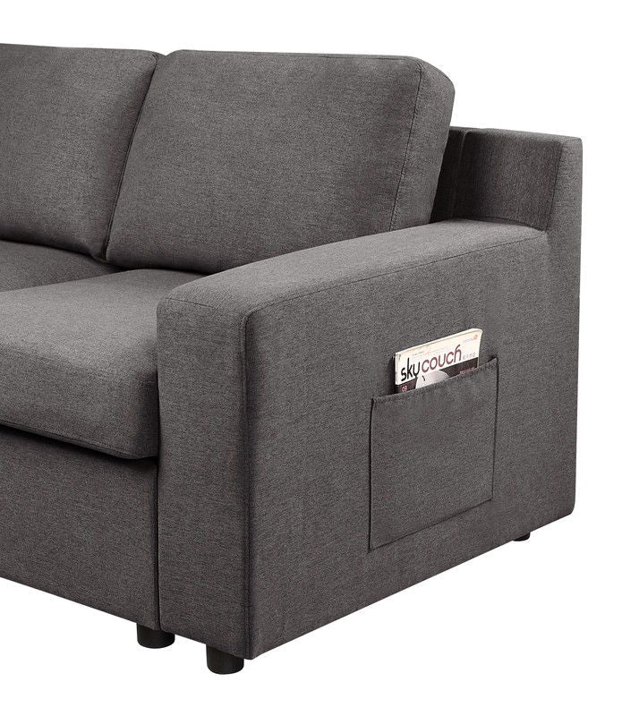 Waylon stationary sectional sofa in gray fabric with a built-in magazine pocket on Tampa Home & Garden Store