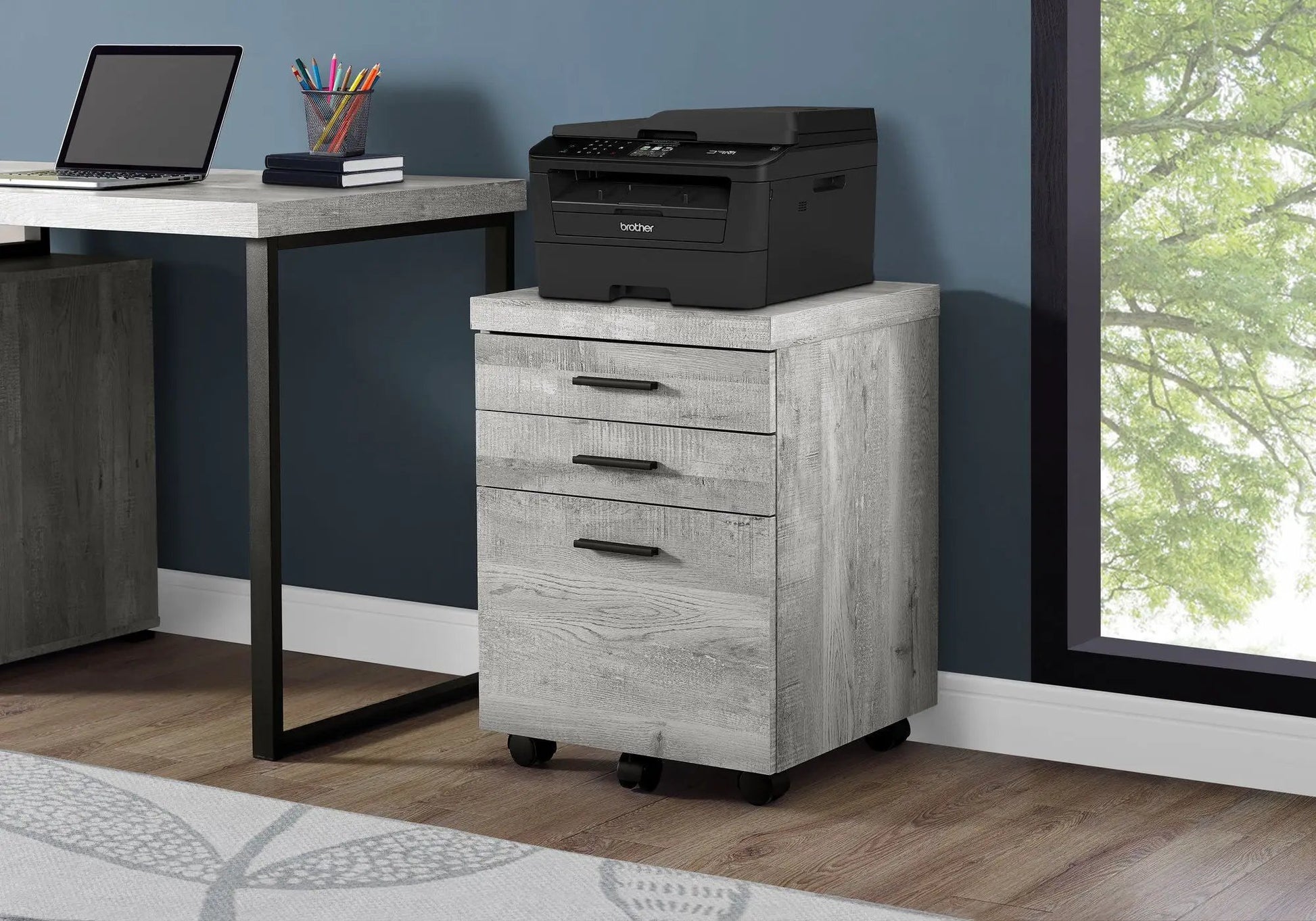 Rolling file cabinet with storage drawers in gray wood finish supporting a Brother printer on Tampa Home & Garden Store