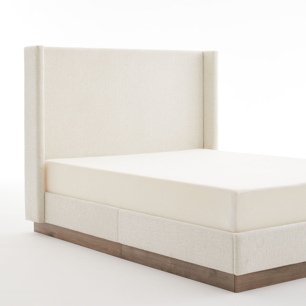 Hosford minimalist upholstered wingback bed with light beige fabric and wood base platform on Tampa Home & Garden Store