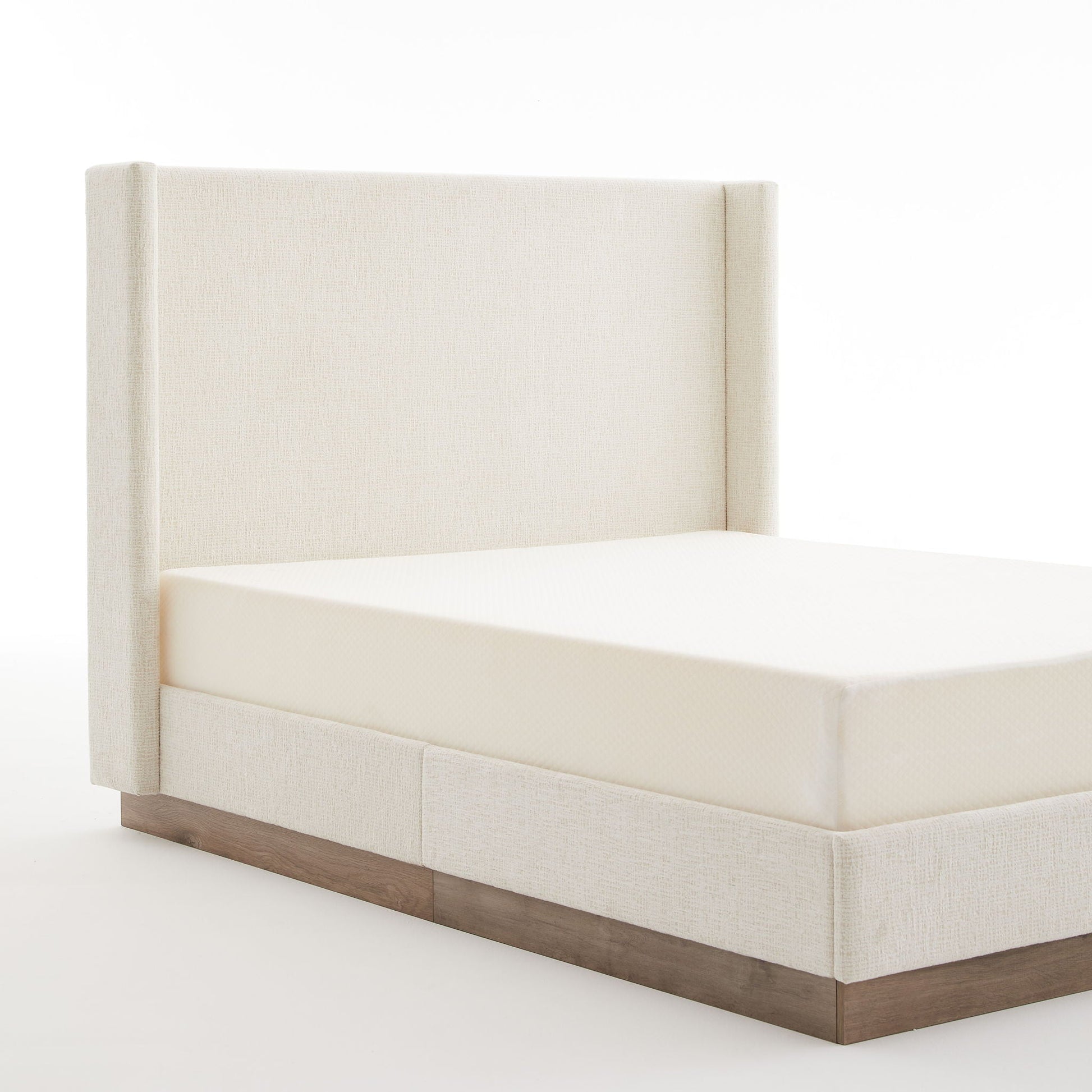 Hosford minimalist upholstered wingback bed with light beige fabric and wood base platform on Tampa Home & Garden Store