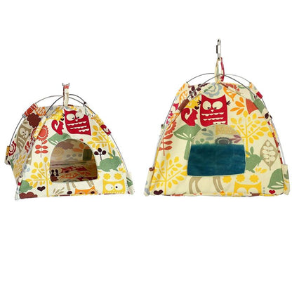 Two hanging canvas parrot tents for birds, colorful leaf-print design with metal hooks on Tampa Home & Garden Store