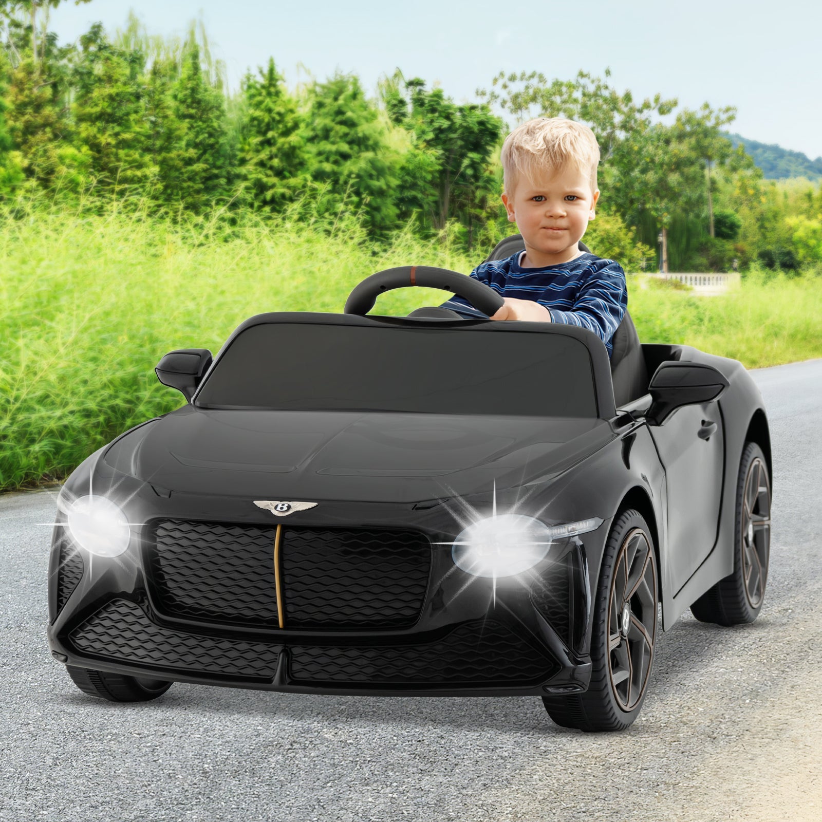 12V powered Bentley Bacalar kids ride-on car with a child at the wheel, black finish on Tampa Home & Garden Store