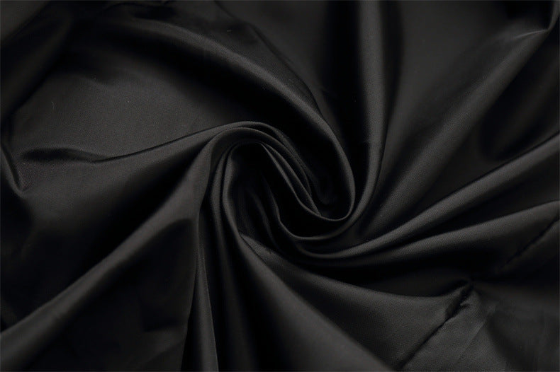 Black satin-like fabric swatch from Stevvex on Tampa Home & Garden Store