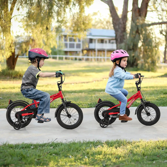 14 Inch Kids Bike with reflectors and bell; two kids ride with helmets on Tampa Home & Garden Store