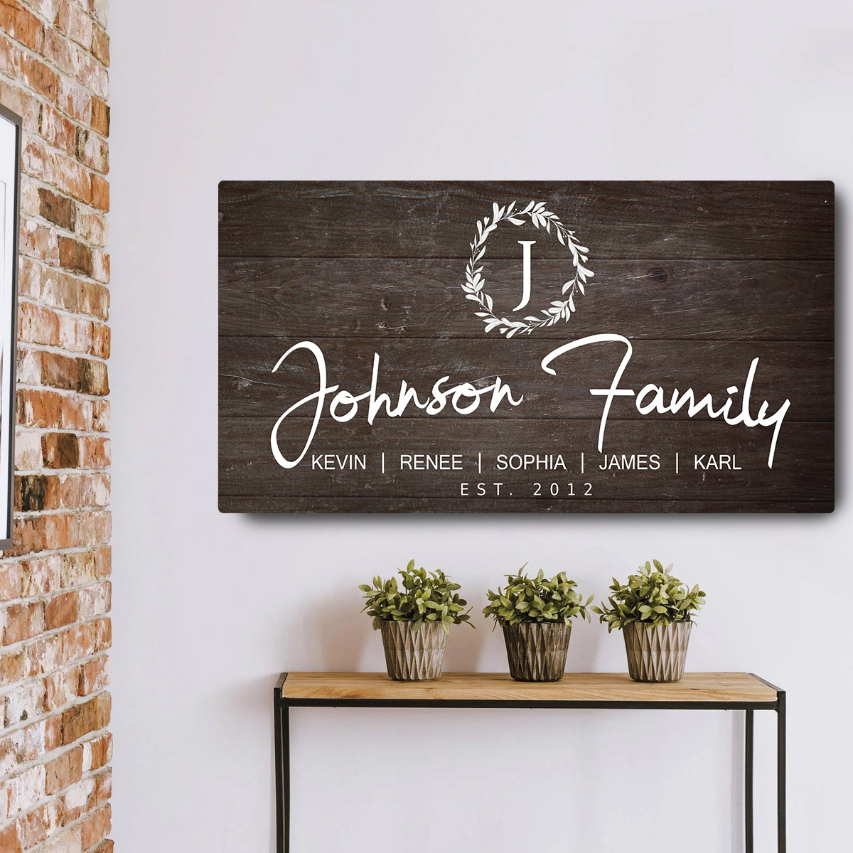 Personalized Rustic Family Sign canvas with dark wood background and white Johnson Family script on Tampa Home & Garden Store