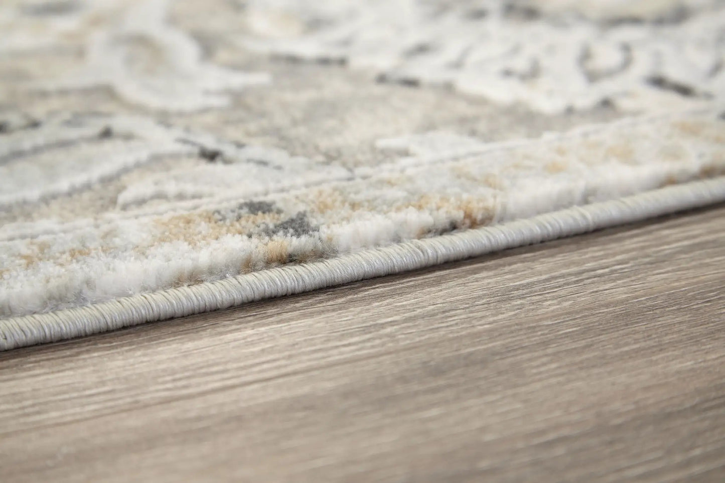 Kilkenny rug, beige-gray area rug with subtle pattern and plush pile, edge binding on Tampa Home & Garden Store