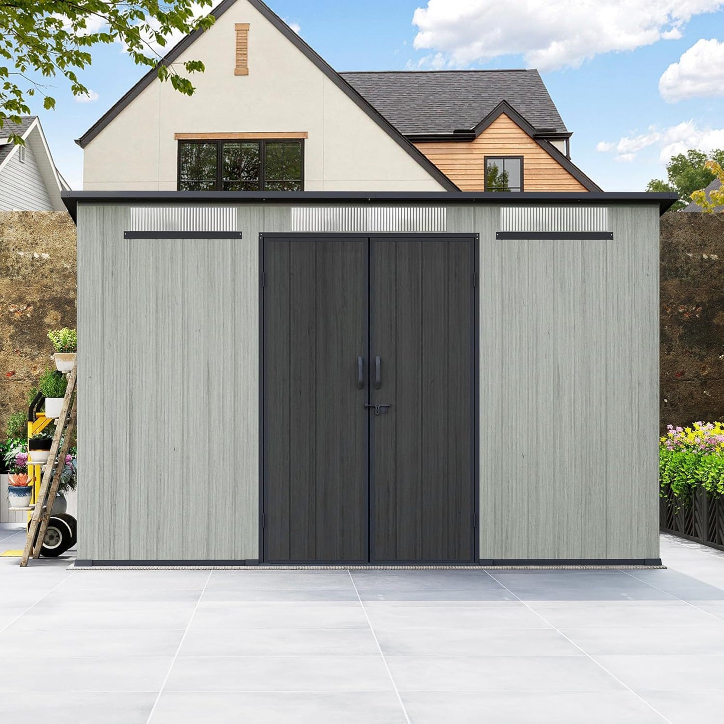 6x11ft outdoor resin storage shed with gray vertical panels and dark double doors on Tampa Home & Garden Store