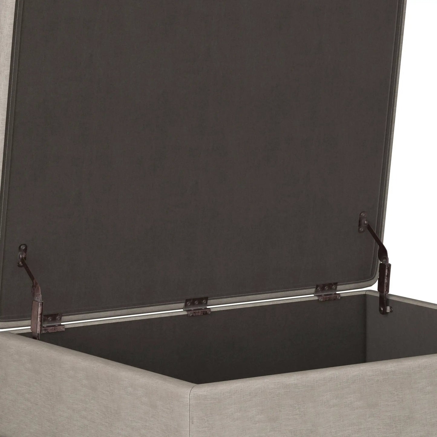 Owen upholstered rectangular storage ottoman in dark charcoal fabric with metal hardware on Tampa Home & Garden Store