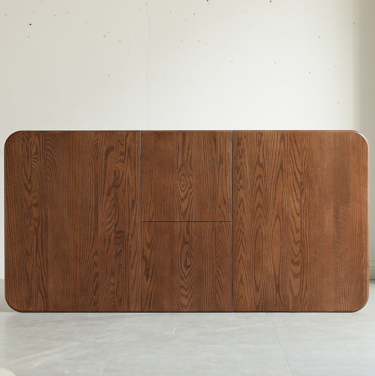 Telescopic wood dining table with extendable top in dark walnut wood grain on Tampa Home & Garden Store