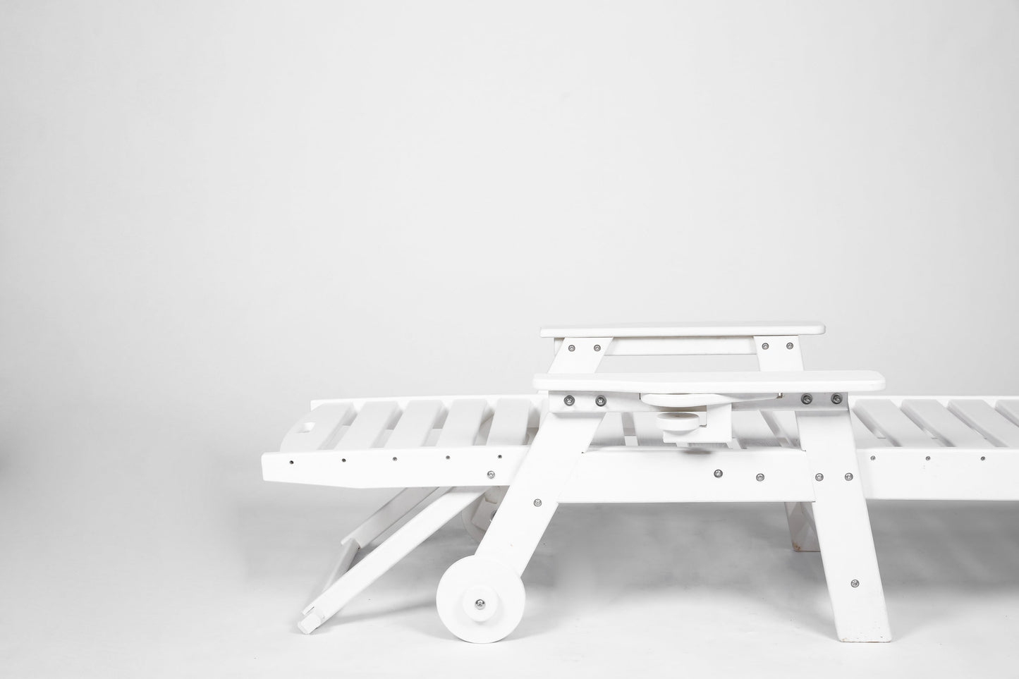 Outdoor chaise lounge in white with adjustable backrest and slatted platform on Tampa Home & Garden Store