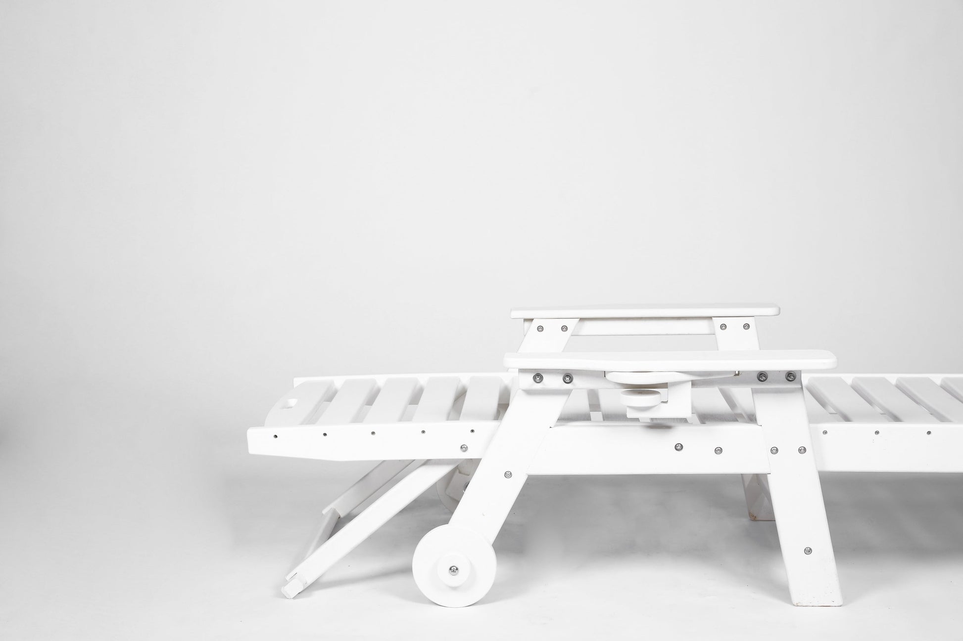 Outdoor chaise lounge in white with adjustable backrest and slatted platform on Tampa Home & Garden Store