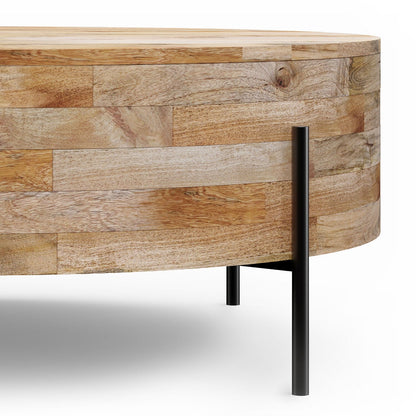 Round coffee table in solid mango wood with a stacked block veneer and slim black metal legs on Tampa Home & Garden Store